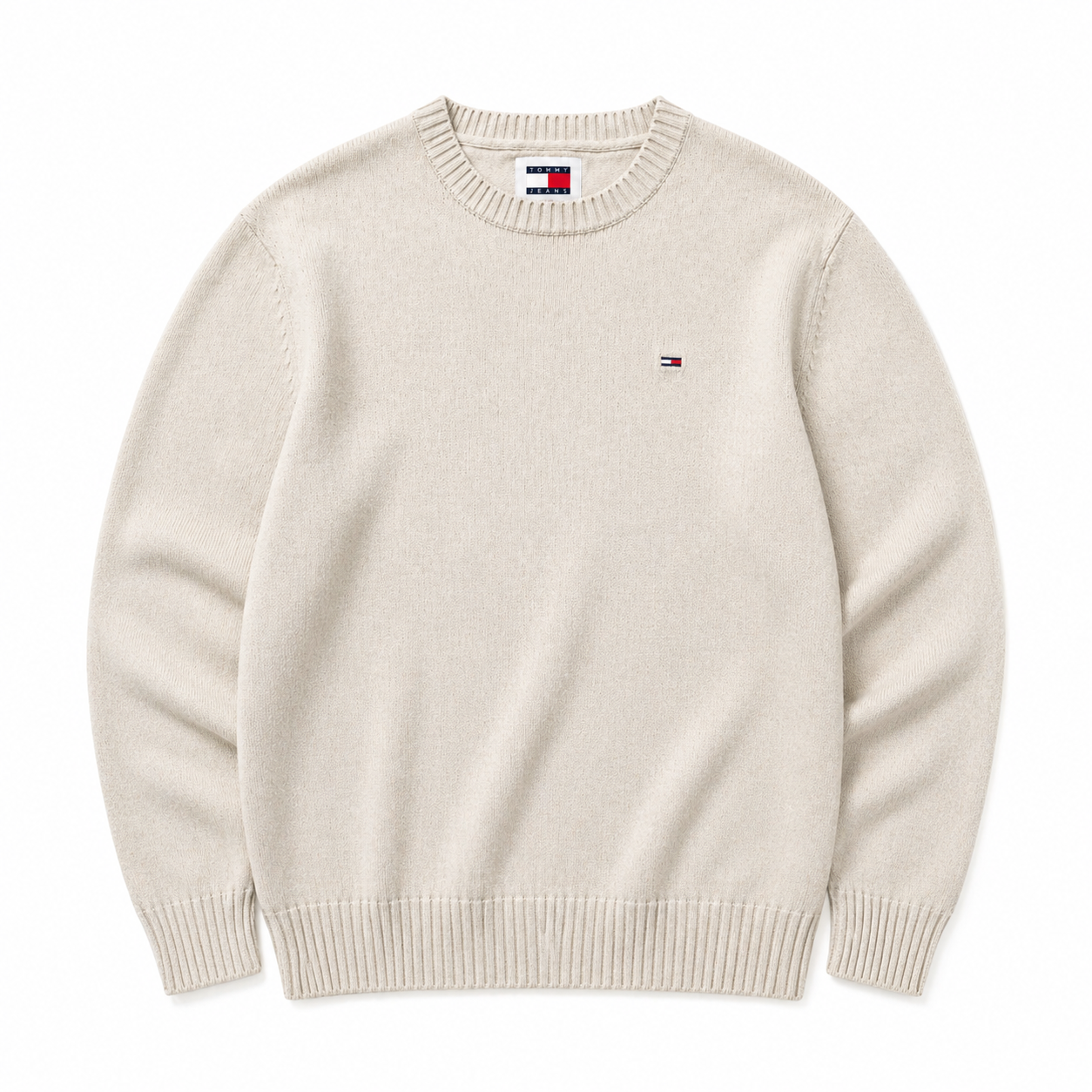 Cream Tommy Jeans striktrøje fra Fabricobe med blød, varm tekstur og klassisk design, perfekt til afslappede outfits.